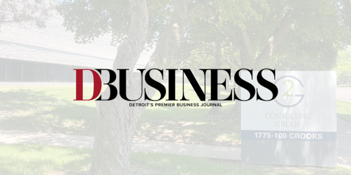 D Business logo displayed over a photo of the G2 Consulting Group office, representing a feature or recognition in Detroit's premier business journal